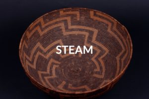 Handwoven basket with "STEAM" showing the topic of the course.